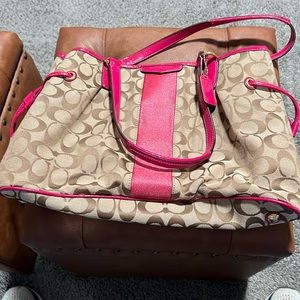 Coach handbag with hot pink accents